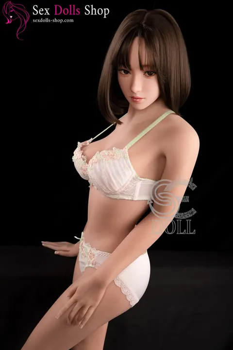 Brunette Strips Nude and Displays Her Ass and Breasts – photo 2 of 21
