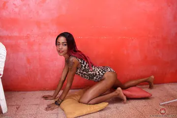 Skinny Ebony Babe Reveals Her Shaved Pussy