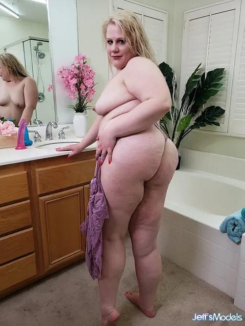 Curvy Mary: Chubby Blonde Gives a Titjob and Uses a Dildo in the Bathroom – photo 6 of 21
