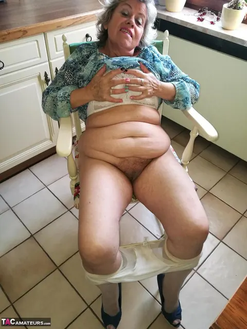 European BBW Masturbates with a Banana on a Kitchen Chair – photo 1 of 19