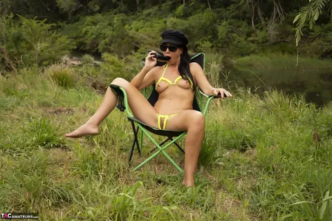 Brunette MILF in a Bikini Masturbates and Sucks Cock Outdoors – photo 14 of 16