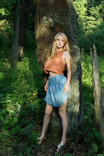 Tall Blonde Spreads Her Hairy Pussy in the Forest