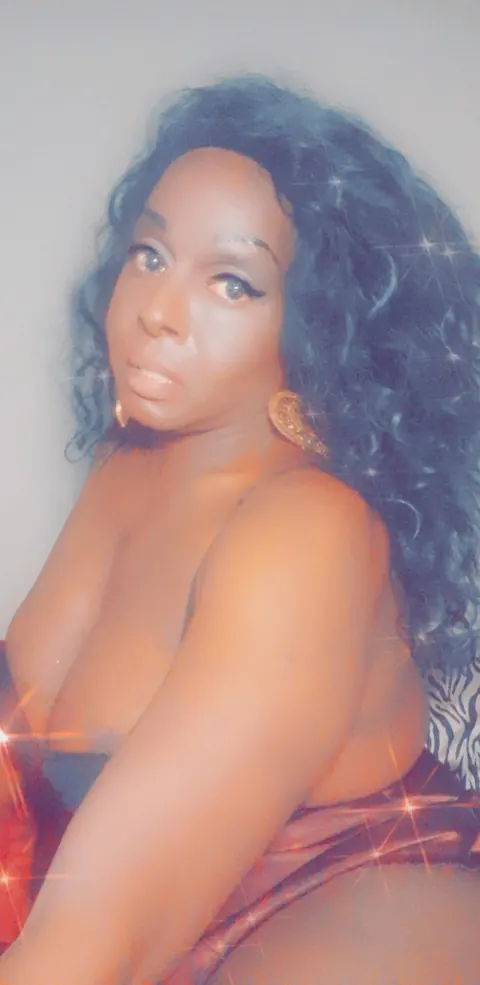 Ebony Trans MILF Reveals Her Big Tits and Cock – photo 14 of 14