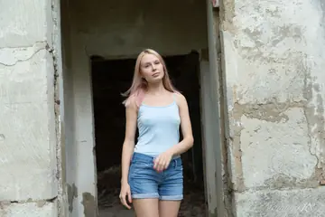 European Blonde Strips Out of Her Jeans at Ruined Dwelling