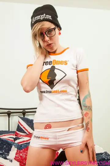 Blonde in Glasses with Natural Tits Uses a Black Dildo