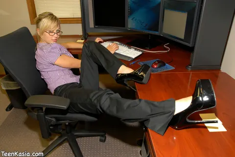 Blonde Secretary Pulls Thong Aside and Fingers Her Pussy in the Bathroom – photo 4 of 12