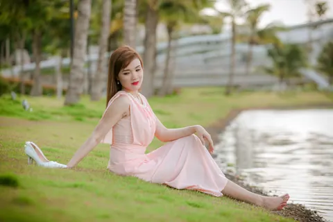 Thick Asian Redhead Poses in a Dress and Heels on the Beach – photo 8 of 21