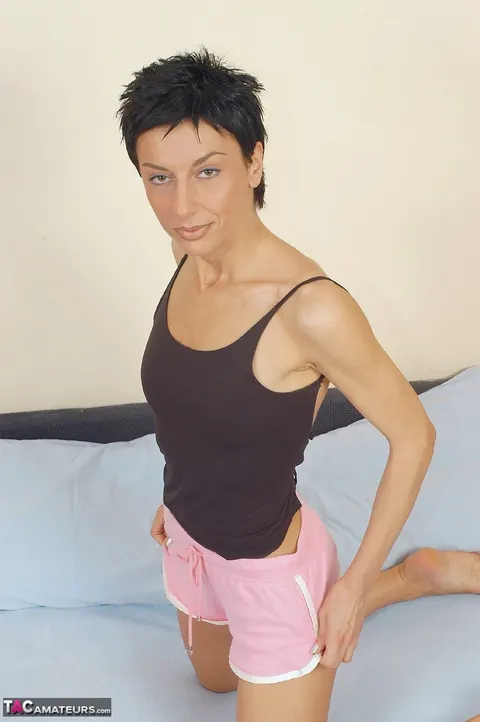 Susy Rocks: Tall Slim Brunette Shows Her Small Tits in Shorts and Panties – photo 6 of 20