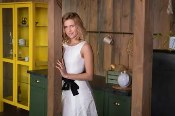 Blonde Spreads Her Hairy Pussy in the Kitchen