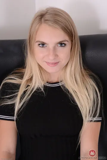 Petite Blonde with Tattoos Strips Naked and Poses