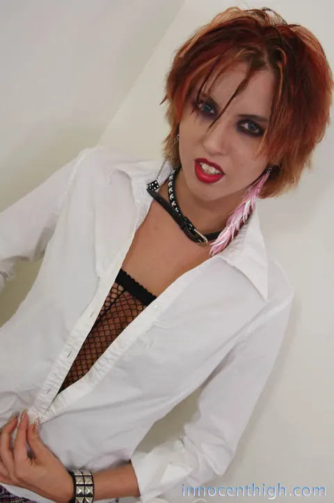 Jordan Ashley: Redhead with Short Hair Flashes Her Natural Tits in Fishnets – photo 10 of 17