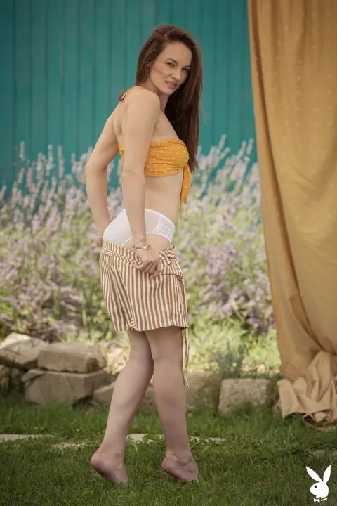 Rita Y: Brunette with Small Natural Tits Strips Nude in the Garden – photo 4 of 21