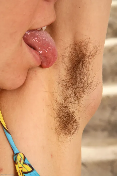 Hairy Brunette in a Bikini Fingers Her Furry Muff – photo 4 of 21