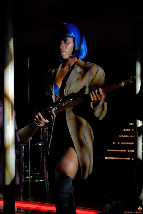 European Model in Lingerie and Boots Poses with a Rifle – photo 6 of 16