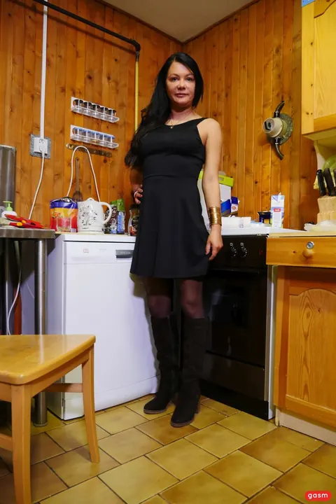 Anna Von Freienwalde: German MILF in a Dress and Stockings Poses in the Kitchen – photo 3 of 15