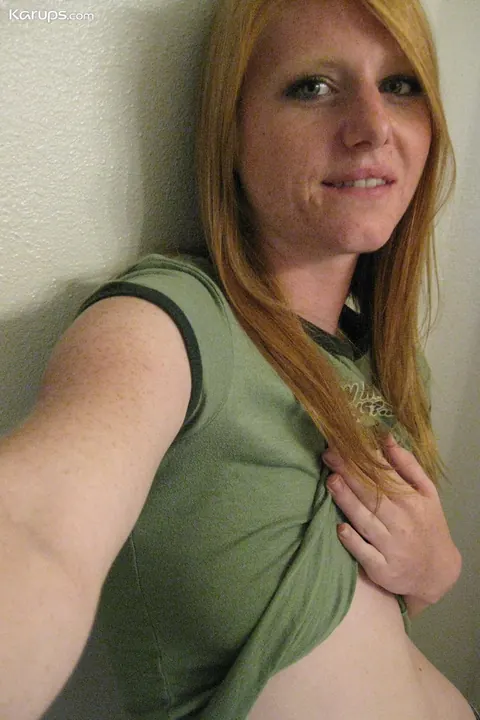 Pale Redhead with Big Tits Reveals Her Body in the Mirror – photo 7 of 20