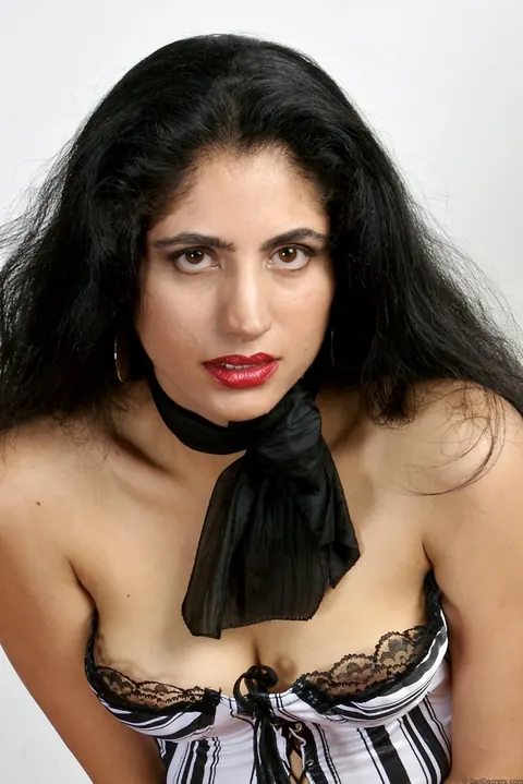 Indian Brunette Frees Her Boobs from a Corset in Heels – photo 6 of 15