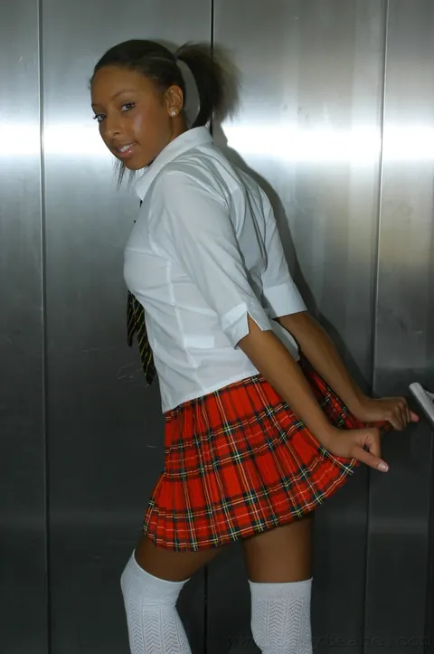 Amy Lou: African Brunette Strips Off Her Uniform to Stockings and Spreads Her Legs – photo 3 of 20