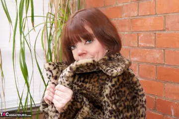 Thick Redhead MILF Reveals Stockings Outdoors
