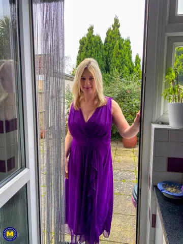 Mature European Blonde Spreads in a Skirt and Panties