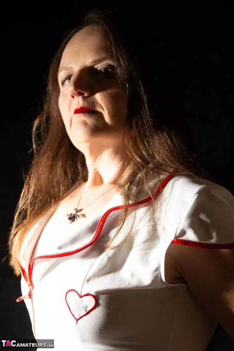 Thick Mature Nurse Lifts Her Skirt and Uses a Strap-On – photo 6 of 16