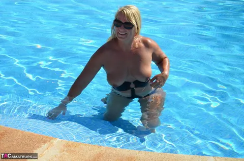 Sweet Susi: Blonde European MILF Frees Big Tits from Bikini at the Pool – photo 15 of 20