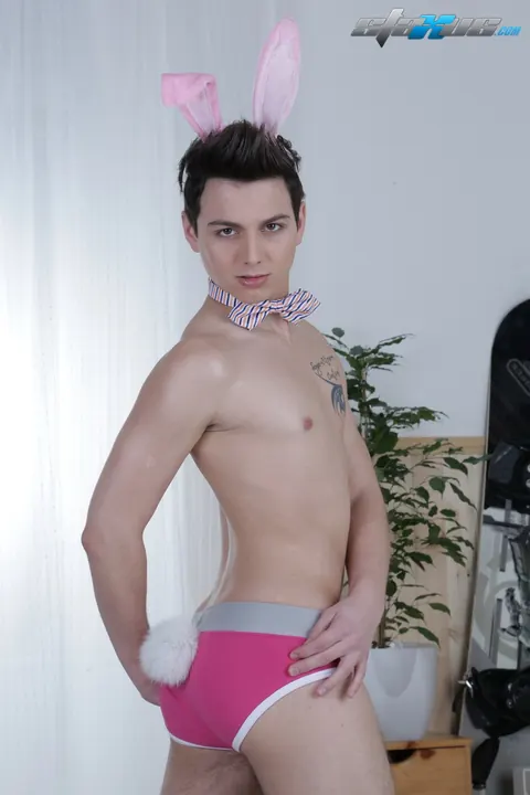 Slim Shaved Guy Strips Nude and Shows His Cock – photo 10 of 21