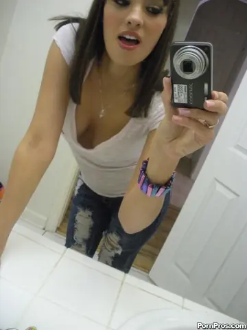 Slim Latina with Big Natural Tits Spreads in Front of a Mirror