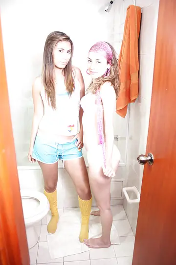 Slim Latina Strips Out of Her Lingerie in the Bathroom