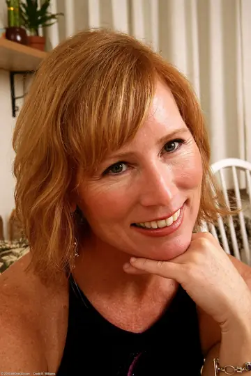 Redhead MILF in Panties Lifts Legs and Spreads Her Pussy Wide