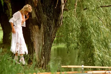 Mature Blonde Woman Spreads Her Pussy by the River