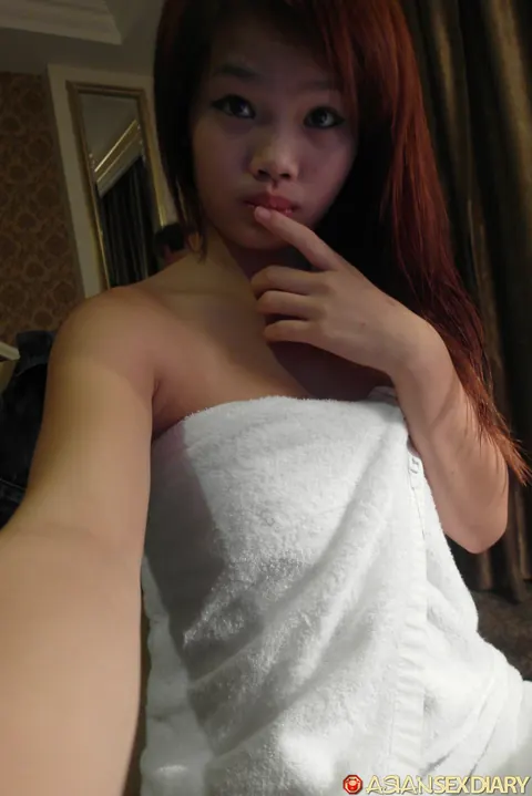 Slim Asian Redhead Takes Anal Doggy Style – photo 1 of 21