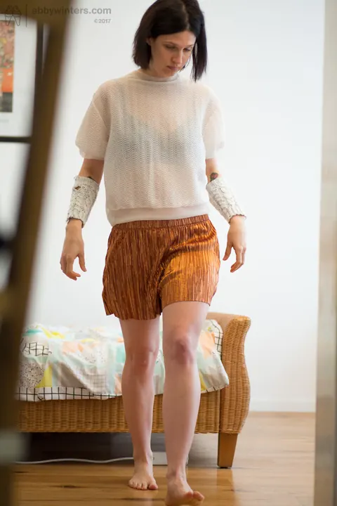 Short-Haired Woman Pulls Up Her Panties While Dressing – photo 17 of 17
