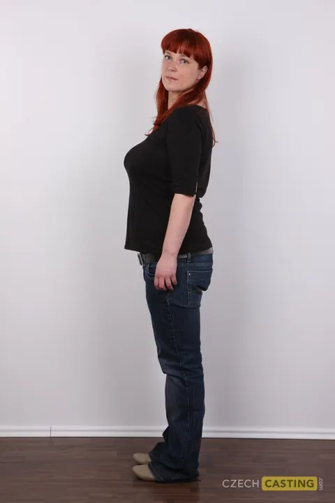 Curvy European Redhead Strips Naked by the Wall – photo 3 of 20