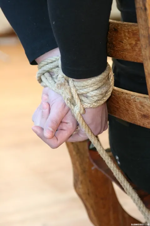 Woman Bound to a Chair and Ball Gagged Outdoors – photo 14 of 17