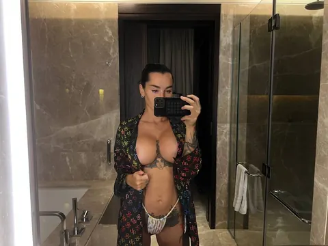 Short-Haired Brunette Flaunts Her Big Tits in Panties at the Mirror – photo 3 of 10