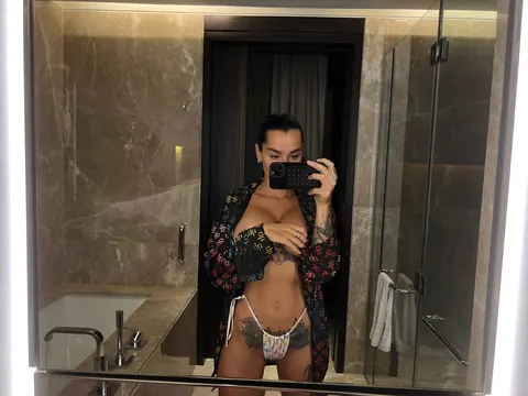 Short-Haired Brunette Flaunts Her Big Tits in Panties at the Mirror – photo 9 of 10