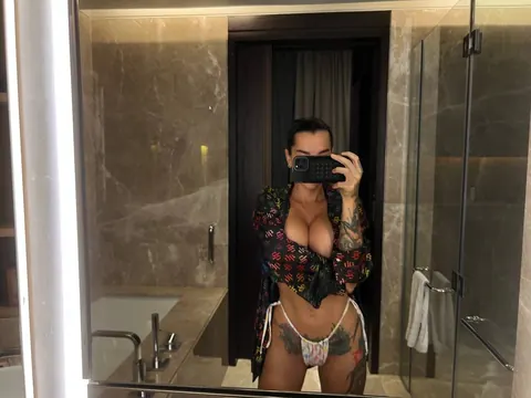 Short-Haired Brunette Flaunts Her Big Tits in Panties at the Mirror – photo 7 of 10