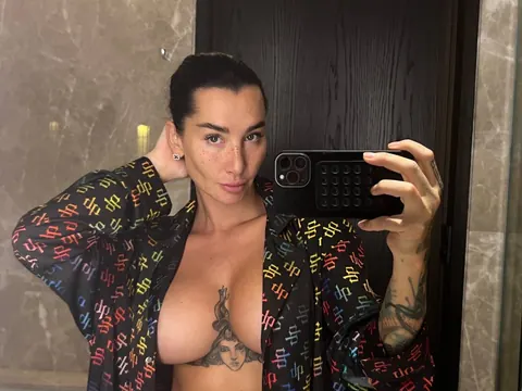 Short-Haired Brunette Flaunts Her Big Tits in Panties at the Mirror – photo 5 of 10