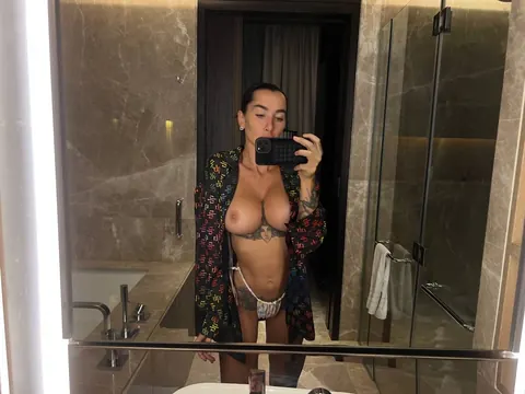Short-Haired Brunette Flaunts Her Big Tits in Panties at the Mirror – photo 6 of 10
