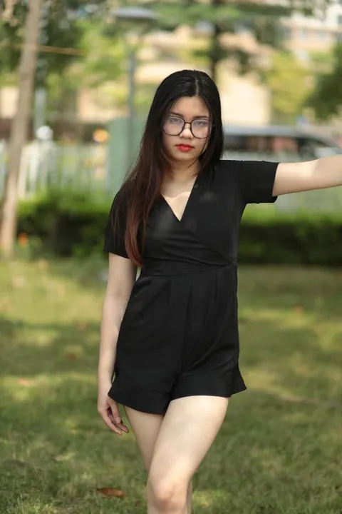 Petite Asian Brunette in Glasses Poses Outdoors in a Dress – photo 4 of 21