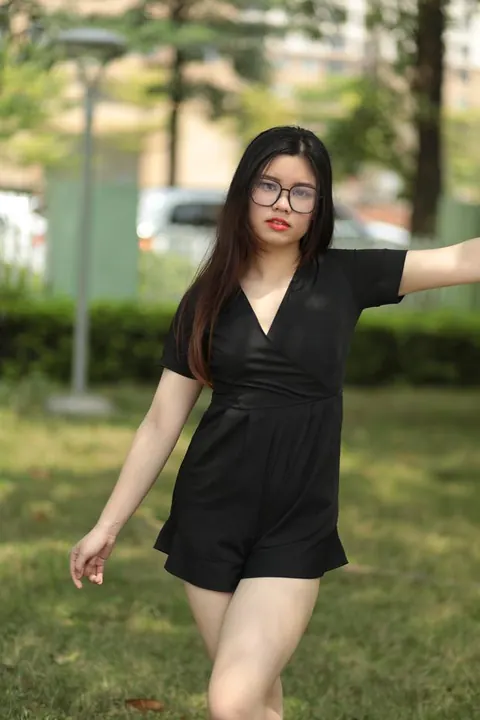 Petite Asian Brunette in Glasses Poses Outdoors in a Dress – photo 5 of 21
