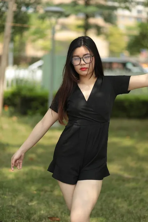 Petite Asian Brunette in Glasses Poses Outdoors in a Dress – photo 6 of 21