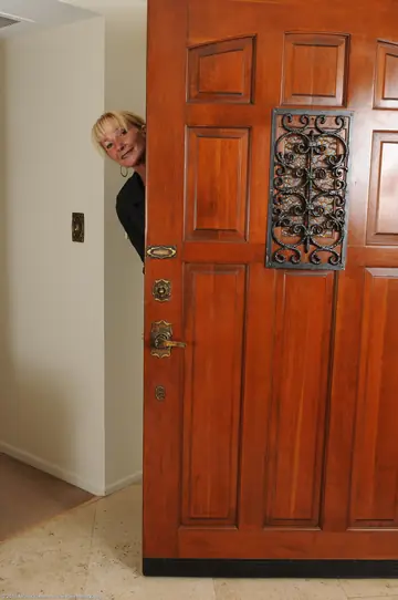 Mature Blonde MILF Undresses and Poses Naked
