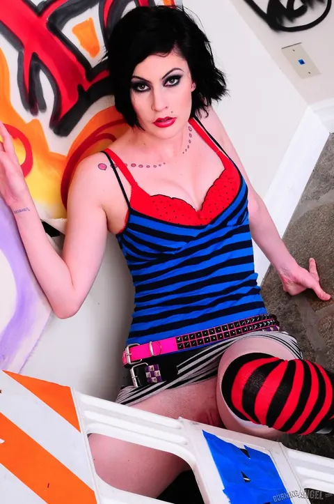 Pixie Pearl: Tall Brunette Spreads Her Shaved Pussy in a Mini Skirt – photo 2 of 17
