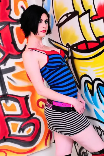 Tall Brunette Spreads Her Shaved Pussy in a Mini Skirt