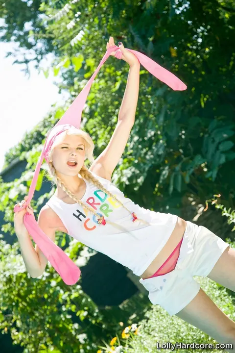 Lolly Hardcore: Petite Blonde in Pigtails Spreads Her Pussy by the Pool – photo 8 of 21