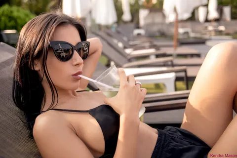Kendra Mason: Brunette Babe in a Bikini and Shorts Poses by the Pool – photo 10 of 15