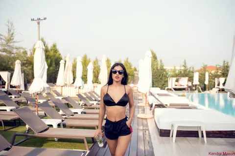 Kendra Mason: Brunette Babe in a Bikini and Shorts Poses by the Pool – photo 11 of 15