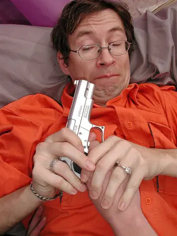 Mature Woman in a Costume Uniform and Glasses Sucks and Fucks on the Sofa